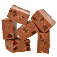 Milk chocolate cubes filled with orange candied fruit isolated