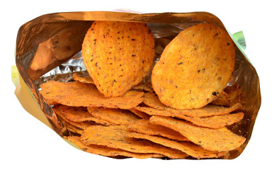 Pile of corn chips in packaging close up isolated
