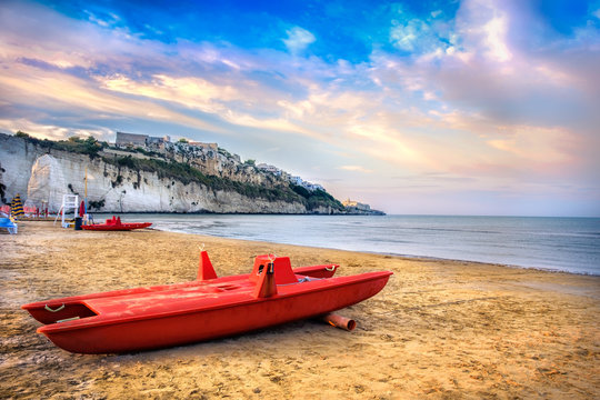 paradise beach sunset boat in Vieste Gargano - Italy