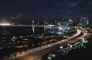 Fototapeta premium Skyline of capital city Luanda and its seaside during the night, Angola, Africa