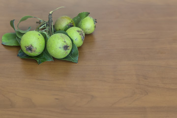 pear on the wooden background.