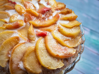 Sweet holiday cake with peaches and cream
