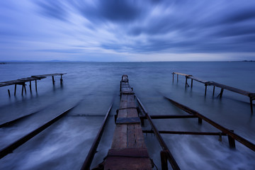 Seascape during sunset. Beautiful natural seascape, blue hour. Sea sunset at the Black Sea coast. Magnificent sunset with clouds in the middle of December.Ravda, Bulgaria