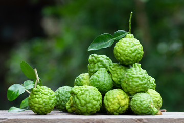 fresh bergamot fruit on wooden table background