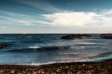 Panorama of the beach coastline with the famous Skagen Grey Lighthouse, Skagen Grå Fyr in colorful , Skagen, Grenen in North Jutland in Denmark, Skagerrak, North Sea, Baltic Sea