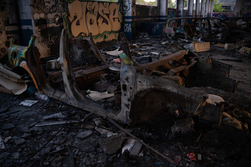Wasted cars in abandoned car dealership