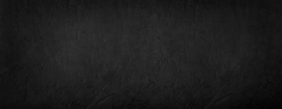 Black stone background, grey cement texture. Top view, flat lay