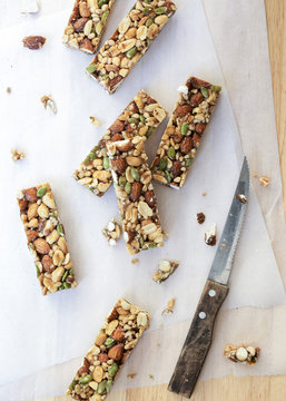 Honey, nut and seed bars on baking paper.