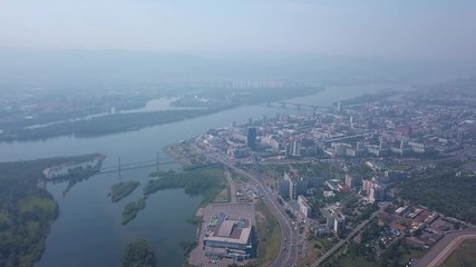 Beautiful aerial drone shot of the Krasnoyarsk city and the Yenisei river