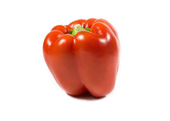 Ripe sweet pepper of red color in a cut on a white background. Delicious, juicy, healthy green pepper Vegetable natural vegetables of rural production. 
