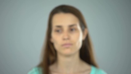 Stop sexual assault sign on womans hand, female rights protection, awareness