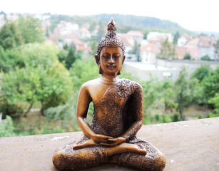 Buddha wooden statue in meditation