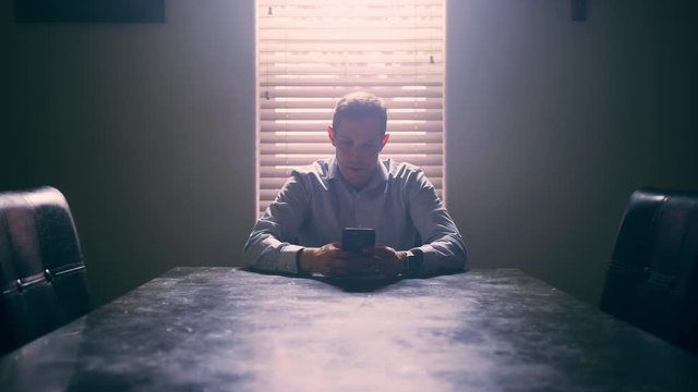 4k Frustrated Businessman, receiving a text with bad news.