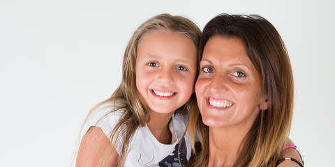cheerful portrait family girl child daughter with pretty young mother woman