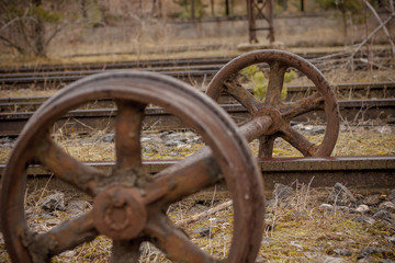 Old train wheels in the abandoned Canfranc Station in Spain
