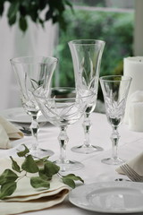crystal glasses on the table in the restaurant table setting