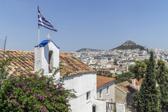 A panorama of Athens seen from the Anafiotika housing estate just off the northern slope of the Acropolis.