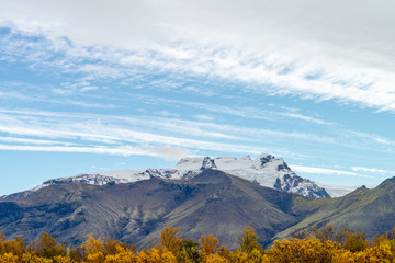 Hvannadalshnukur mountain peak in autumn view from Skaftafell camping ground.