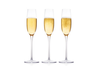 Elegant glasses of yellow champagne with bubbles