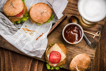 Mini beef burgers served in pub or bar