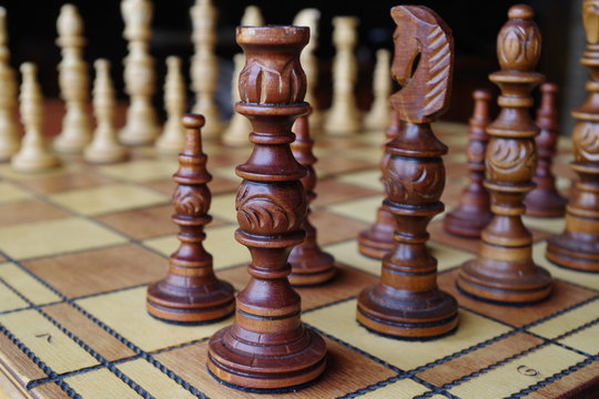 Close-up picture of chess game can be used on business or conflict concepts.