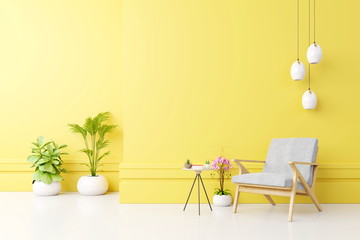 Living room interior with fabric armchair ,lamp,book and plants on empty yellow wall background.3d rendering