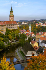 View to Cesky Krumlov and river Vltava, view of the city from the top in the sunny autumn day. Czech Republic. Historical town. UNESCO World Heritage.