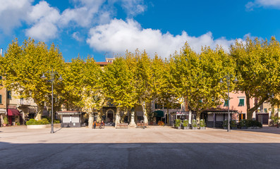 CASCIANA TERME, ITALY - NOVEMBER 5, 2015: Sunny autumn in Piazza Giuseppe Garibaldi