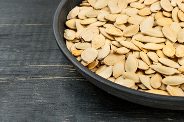 Pumpkin seeds in frying pan