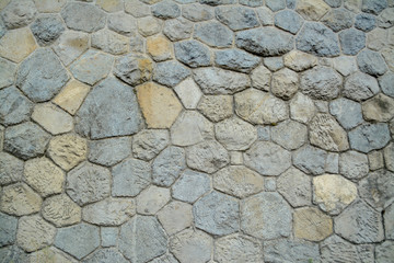 The old wall of stone blocks