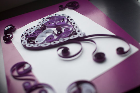 Paper heart made in quilling craft technic