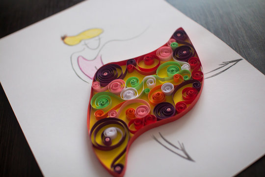 Paper dancer made in quilling craft technic