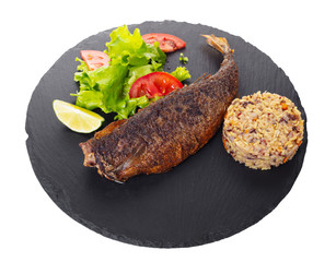 cooked fish with rice and vegetables