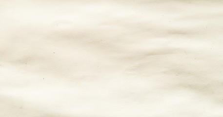White recycled paper background or texture. Kraft beige crumpled texture, background and wallpaper.