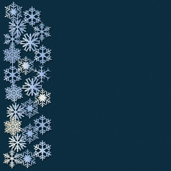 Snowflakes at the left on a dark blue background