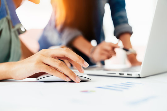 Business meeting, Young coworker team making business discussion in modern office. Teamwork people concept. Casual account manager crew working new startup project on laptop. Presentation