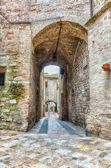 Scenic streets of the medieval town of Assisi, Umbria, Italy