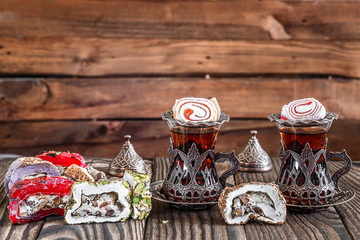 Fragrant Turkish tea and Turkish sweets in national dishes