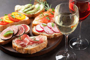 Brushetta or spanish tapas set with wine