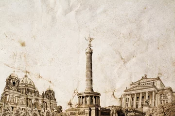  A composition of the famous landmark of Berlin in Germany on an old vintage crumpled paper with space for text at the top. Vintage, grunge, old, retro postcard style photo. © HappyRichStudio