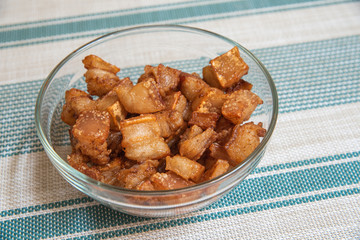 Bowl with crackling on striped background