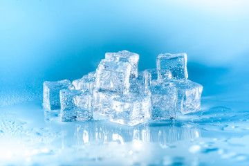 Obraz premium Pyramid of melted ice cubes with drops