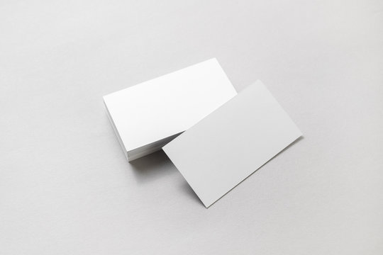 Blank business cards on paper background. High size mockup.