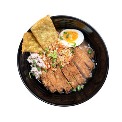 Thai spicy noodle,Thai noodle tom yum with fried pork and egg isolated on white