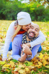 happy young couple   in the autumn park