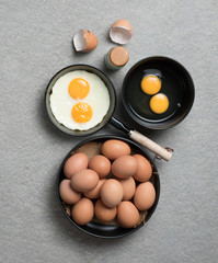 Fried eggs in a frying pan,top view