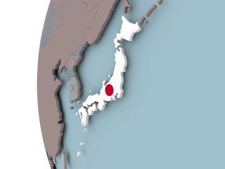 Japan with flag on globe