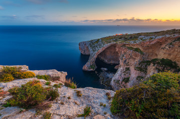 Fototapeta na wymiar Blue Grotto Malta at Sunset