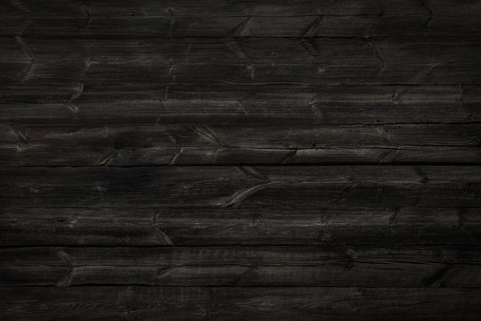 Old, long  planks. Black texture of  wood.