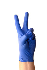 Closeup of a male hand in a medical glove shows symbol of peace.